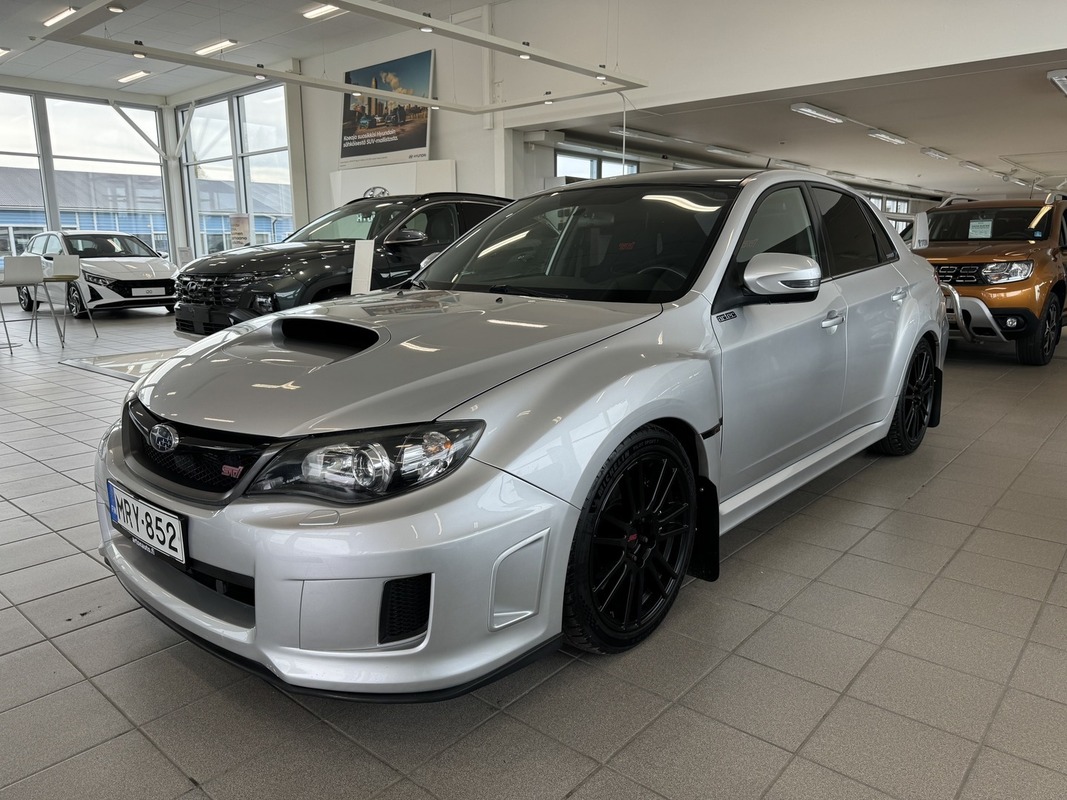 Subaru Impreza 2,5 WRX STI Sedan **KORKO ALK. 2.99% + KULUT!**, vm. 2010, 214 tkm (1 / 9)